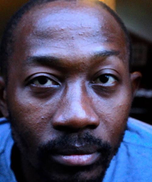 Portrait Russel (16to9_300dpi) (1) - Russel Hlongwane